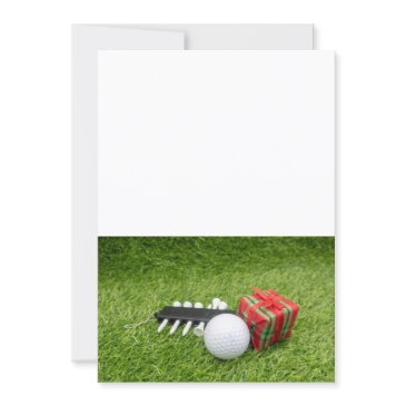 golf christmas with golf ball and gift on green invitation