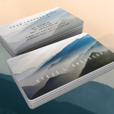 layers of mountain ranges in shades of blue © business invitations