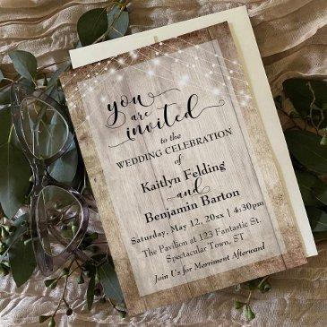 rustic light brown wood w/ light strings, wedding invitation