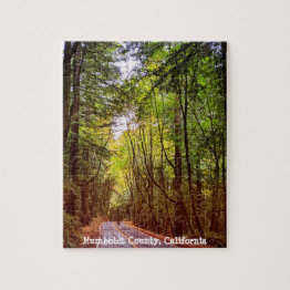 Small Wet Road Through Green Trees In Humboldt Autumn Jigsaw Puzzle Front View