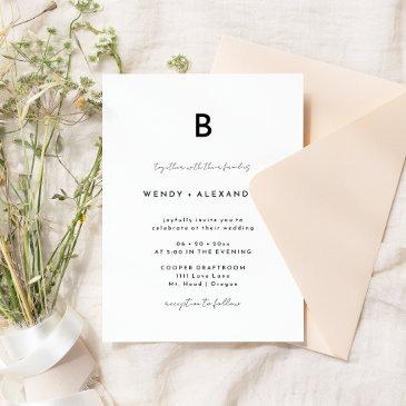 white modern script monogram wedding invitation